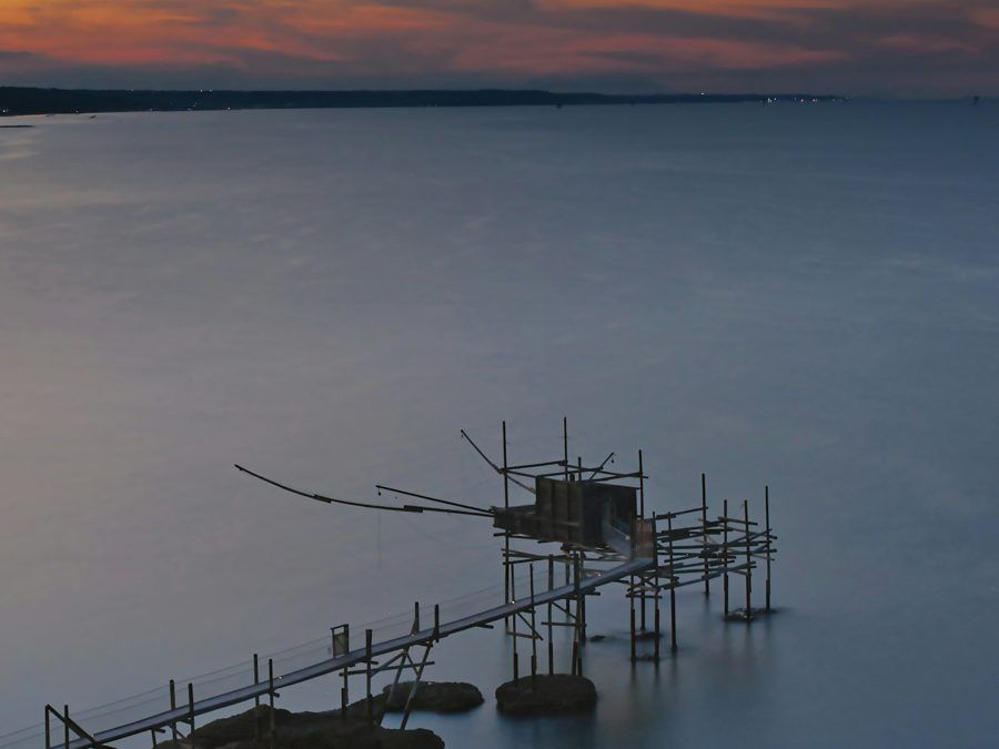 A wooden fishing platform over the sea at Punta Aderci