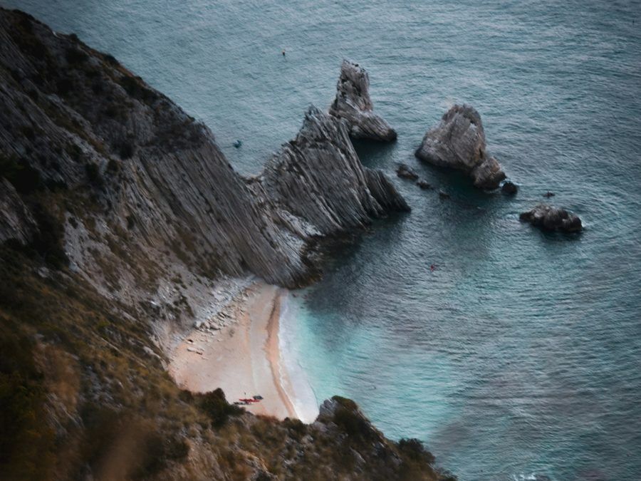 Two sea stacks below Monte Conero