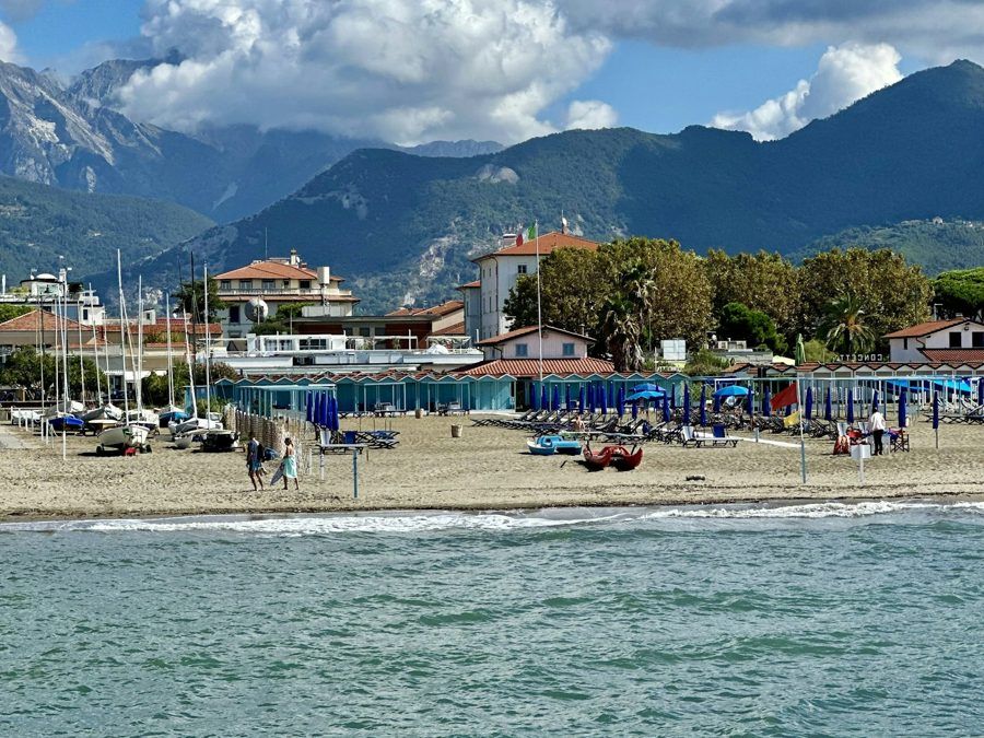 The beach of Forte dei Marmi below the Apuan Alps